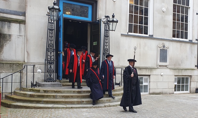 The Beadle leads the Shrove Tuesday procession from Stationers' Hall to St Paul's 