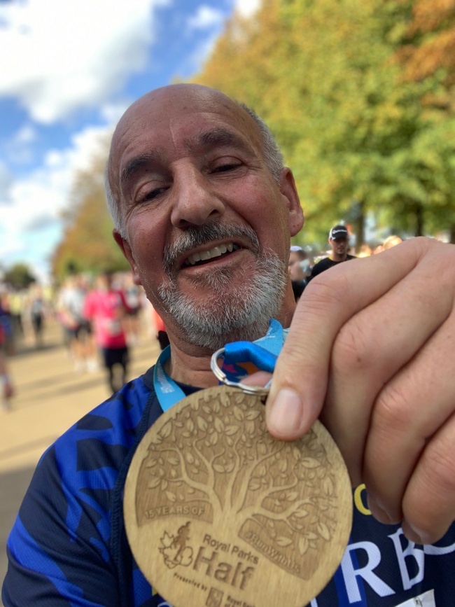 Doug Wills with his half maraathon medal